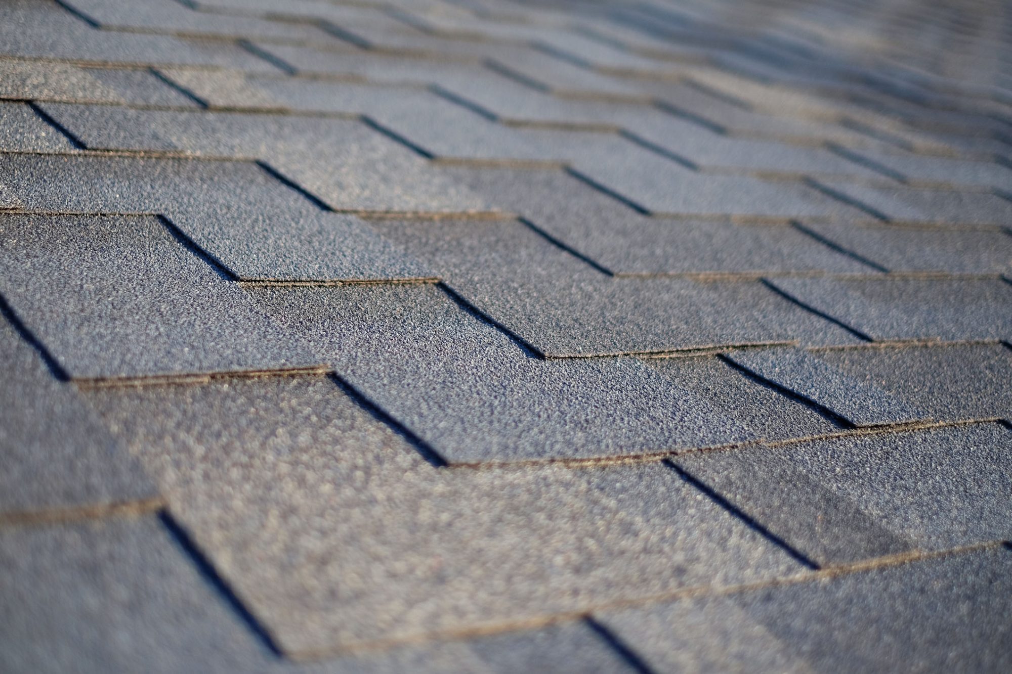 dreamstime_m_107766334 Close up view on Asphalt Roofing Shingles Background. Roof Shingles - Roofing.